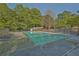 Relax and unwind at the community's inviting swimming pool with ample lounging space at 384 Parc River Blvd, Lawrenceville, GA 30046