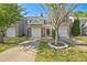 Charming townhome featuring a well-maintained lawn and an attached one-car garage at 384 Parc River Blvd, Lawrenceville, GA 30046
