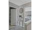 This hallway features a closet, table with décor, and access to the main bedroom at 384 Parc River Blvd, Lawrenceville, GA 30046