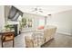 Inviting living room with fireplace, large screen TV, wood floors and lots of seating at 384 Parc River Blvd, Lawrenceville, GA 30046