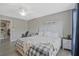 Bright bedroom with natural light, neutral decor, and a ceiling fan at 384 Parc River Blvd, Lawrenceville, GA 30046