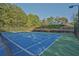 Enjoy a match on this pristine tennis court within a well-maintained community at 384 Parc River Blvd, Lawrenceville, GA 30046