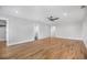 Expansive bedroom with hardwood flooring, recessed lighting, and doorways to closet and bathroom at 915 John Ward Rd, Marietta, GA 30064