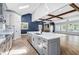 Stunning kitchen with stainless steel appliances, a large island, and open view of the living area at 915 John Ward Rd, Marietta, GA 30064