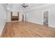 Spacious main bedroom featuring hardwood floors, fireplace, and view to ensuite bath at 915 John Ward Rd, Marietta, GA 30064