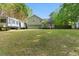 Large backyard with ample space for RV parking, featuring a well-maintained lawn and fence at 655 Poplar Rd, Dallas, GA 30157