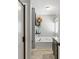 Bathroom showcasing walk-in shower and soaking tub at 655 Poplar Rd, Dallas, GA 30157