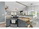 Open kitchen concept with countertops, dining area, and plenty of natural light at 655 Poplar Rd, Dallas, GA 30157