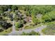 Expansive aerial view of a single-Gathering home showcasing its large lot and surrounding mature trees at 2405 Old Salem Se Rd, Conyers, GA 30013