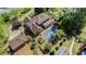 Spacious property with pool, outbuildings, and lush greenery from an aerial view at 2405 Old Salem Se Rd, Conyers, GA 30013