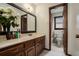 Bathroom with a sink and vanity with a door to the toilet and shower at 2405 Old Salem Se Rd, Conyers, GA 30013