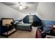 Attic bedroom with blue walls, carpet, dormer window and bed at 2405 Old Salem Se Rd, Conyers, GA 30013
