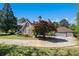 Detached two-car garage with white doors and concrete driveway at 2405 Old Salem Se Rd, Conyers, GA 30013