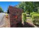 Close up of brick mailbox with house number and a small red flag at 2405 Old Salem Se Rd, Conyers, GA 30013