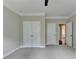 Neutral bedroom features plush carpet, closet and en suite bathroom at 4395 Wildbrooke Pkwy, Cumming, GA 30041
