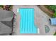 Aerial view of the community pool with a spacious deck and lounge area at 4395 Wildbrooke Pkwy, Cumming, GA 30041