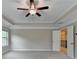 Main bedroom has carpet and an attached bathroom and walk-in closet at 4395 Wildbrooke Pkwy, Cumming, GA 30041
