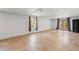 Open basement area with tile flooring, a window, and glass doors to the backyard at 4631 Crooked Creek Ln, Villa Rica, GA 30180