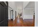 Bright foyer with hardwood floors, high ceilings, and access to multiple rooms at 4631 Crooked Creek Ln, Villa Rica, GA 30180