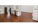 Large kitchen space with white cabinets, wood countertops, and a stainless steel dishwasher at 4631 Crooked Creek Ln, Villa Rica, GA 30180