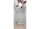 Small laundry room with wood floors, utility hook-ups and ceiling fan at 4631 Crooked Creek Ln, Villa Rica, GA 30180