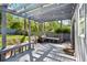 Spacious backyard deck with pergola and integrated benches, ideal for relaxation and outdoor gatherings at 1211 Argonne Ne Way, Atlanta, GA 30324