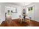 Bright dining area with hardwood floors, a chandelier, and a view to the backyard at 1211 Argonne Ne Way, Atlanta, GA 30324