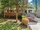Charming brick home featuring a welcoming front porch and beautiful landscaping in a serene setting at 1211 Argonne Ne Way, Atlanta, GA 30324