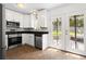 Charming kitchen with stainless steel appliances and direct access to the backyard patio at 1211 Argonne Ne Way, Atlanta, GA 30324