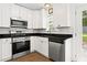 Modern kitchen featuring stainless steel appliances and bright natural light at 1211 Argonne Ne Way, Atlanta, GA 30324