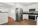 White cabinets and stainless steel appliances accent the kitchen space at 1211 Argonne Ne Way, Atlanta, GA 30324