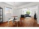 Open-concept living and dining areas with hardwood floors and lots of natural light at 1211 Argonne Ne Way, Atlanta, GA 30324