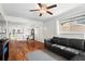 Inviting living room with hardwood floors, ceiling fan, and backyard views at 1211 Argonne Ne Way, Atlanta, GA 30324