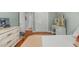 Well-lit bedroom with hardwood floors, neutral walls and closet storage space at 1705 Monroe Ne Dr # D01, Atlanta, GA 30324