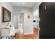 Inviting entryway with hardwood floors, soft gray walls, and view of living space at 1705 Monroe Ne Dr # D01, Atlanta, GA 30324