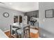 Modern eat-in kitchen with stainless steel appliances, gray cabinetry, and a breakfast bar at 1705 Monroe Ne Dr # D01, Atlanta, GA 30324