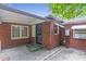 This covered back patio is adjacent to the exterior door at 1766 Sw Brewer Sw Blvd, Atlanta, GA 30310