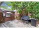 This covered back patio has room for a barbeque at 1766 Sw Brewer Sw Blvd, Atlanta, GA 30310