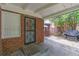 This covered back patio provides shelter and relaxation at 1766 Sw Brewer Sw Blvd, Atlanta, GA 30310