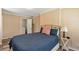 Comfortable bedroom with hardwood floors, soft lighting, and calming neutral wall colors at 1766 Sw Brewer Sw Blvd, Atlanta, GA 30310