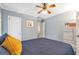 Bedroom featuring hardwood floors, calming wall color, and lots of closet space at 1766 Sw Brewer Sw Blvd, Atlanta, GA 30310