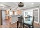 Dining area with hardwood floors and easy access to the kitchen with stainless steel appliances at 1766 Sw Brewer Sw Blvd, Atlanta, GA 30310