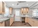 Bright kitchen features granite counters, stainless steel appliances, and ample cabinet storage at 1766 Sw Brewer Sw Blvd, Atlanta, GA 30310