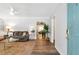Bright living room boasts hardwood floors, a comfortable sofa, and an open layout at 1766 Sw Brewer Sw Blvd, Atlanta, GA 30310