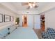 Bright bedroom with an ensuite bathroom, walk-in closet and views into other rooms at 200 River Vista Dr # 236, Atlanta, GA 30339
