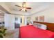 Spacious bedroom features hardwood floors, a comfortable bed, stylish decor, and easy access to a walk-in closet at 200 River Vista Dr # 236, Atlanta, GA 30339