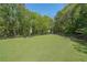 Community dog park and play area with green space, benches, and fencing for safety at 200 River Vista Dr # 236, Atlanta, GA 30339