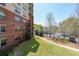 Scenic exterior view showcasing the building, landscaping, and parking area at 200 River Vista Dr # 236, Atlanta, GA 30339