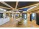 Spacious lobby features wood look tile flooring, neutral paint and large windows with views at 200 River Vista Dr # 236, Atlanta, GA 30339