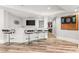 Stylish bar area with seating and TV at 3215 Oxleas Ct, Cumming, GA 30041